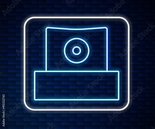 Glowing neon line Spray can nozzle cap icon isolated on brick wall background. Vector.