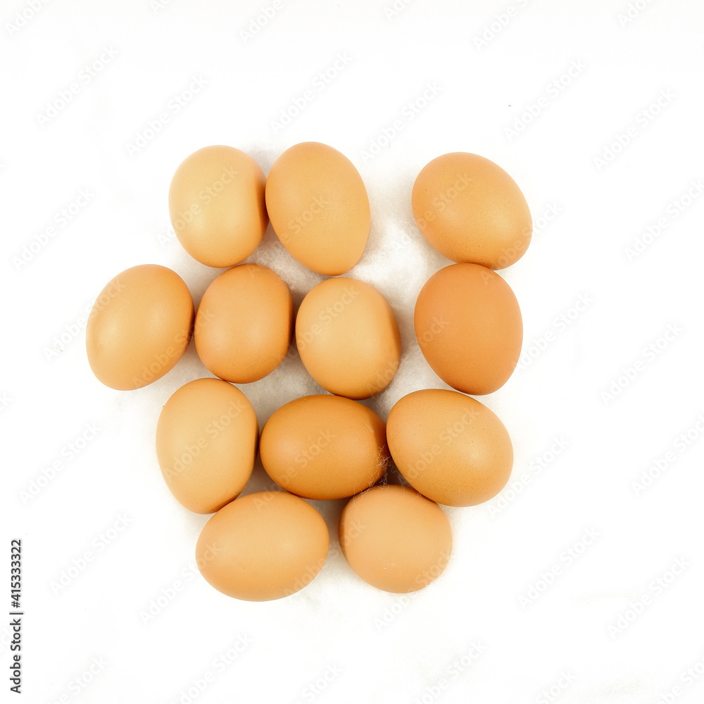 Several eggs are placed on a white background. Several eggs are placed on a white background.
