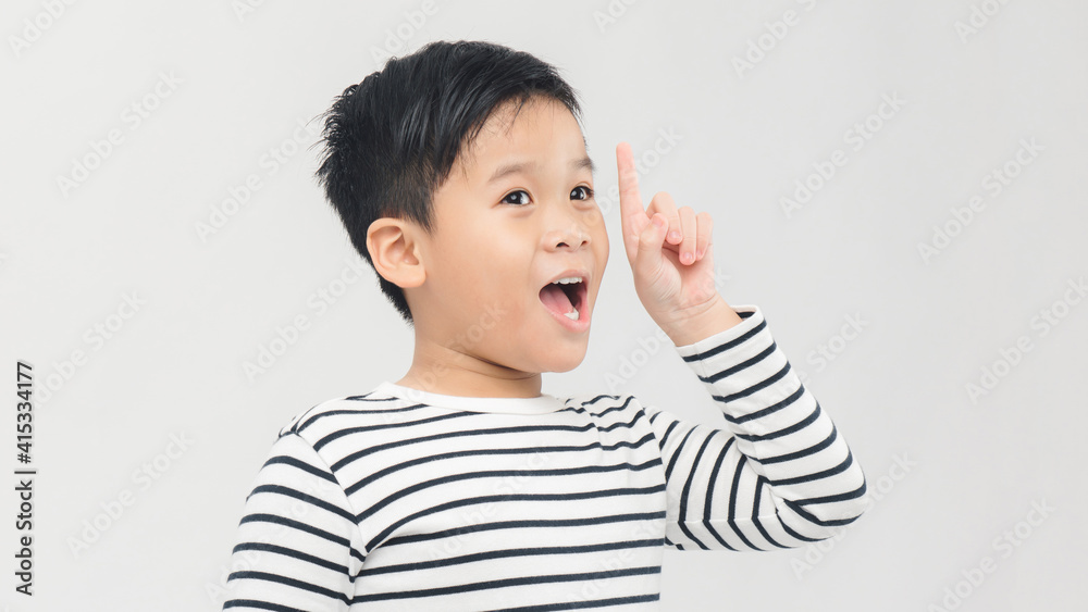 Eureka! Portrait of smart little boy pointing finger up and looking inspired by genius thought, showing good idea sign Eureka! Portrait of smart little boy pointing finger up and looking inspired by genius thought, showing good idea sign