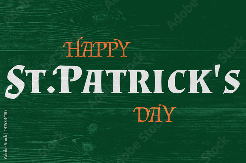happy st. patrick's day, white and orange text over green aged wooden wall