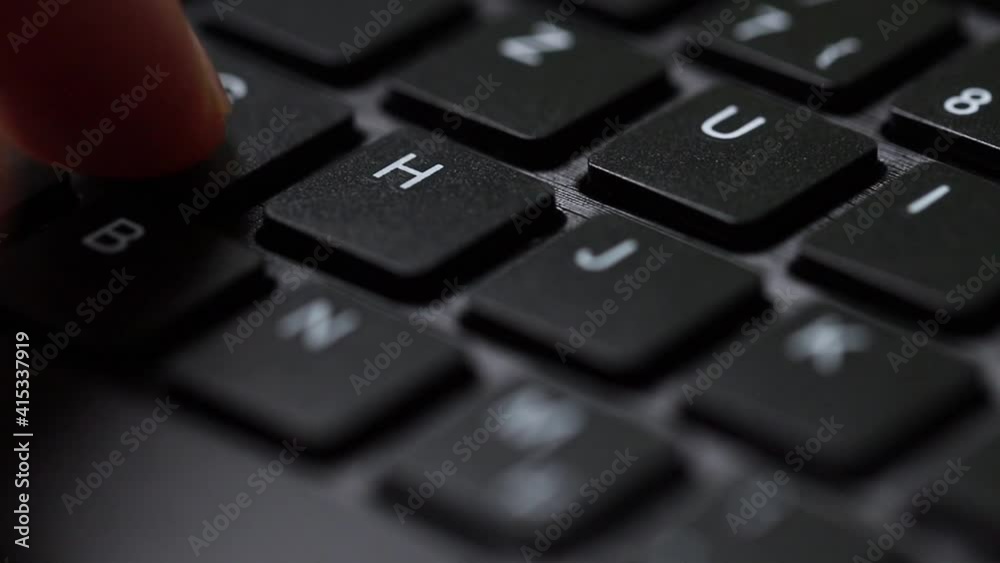 somebody typing on a modern keyboard close up somebody typing on a modern keyboard close up