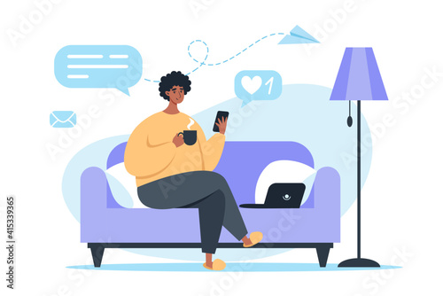 Man sitting on couch and working on laptop, freelance and learning at home