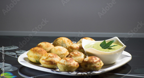 Indian Home Made Recipe 'Aappe' with Green Chatni. Specialty Of South Indian Food