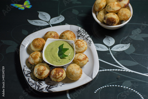 Indian Home Made Recipe 'Aappe' with Green Chatni. Specialty Of South Indian Food