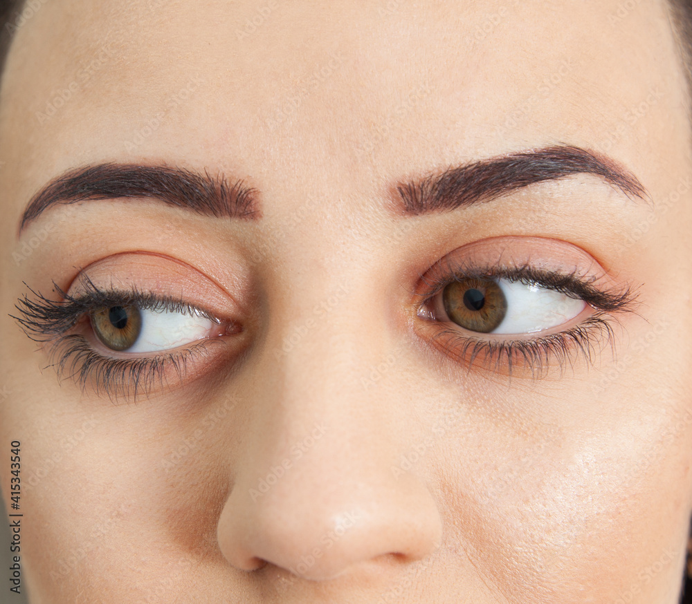 Naklejka premium Beautiful green eyes of a caucasian woman.