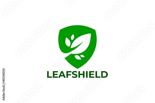illustration of shield and leaf. nature logo vector.