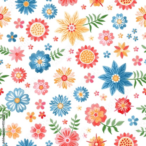 Embroidery colorful flowers on white background. Beautiful vector seamless pattern.