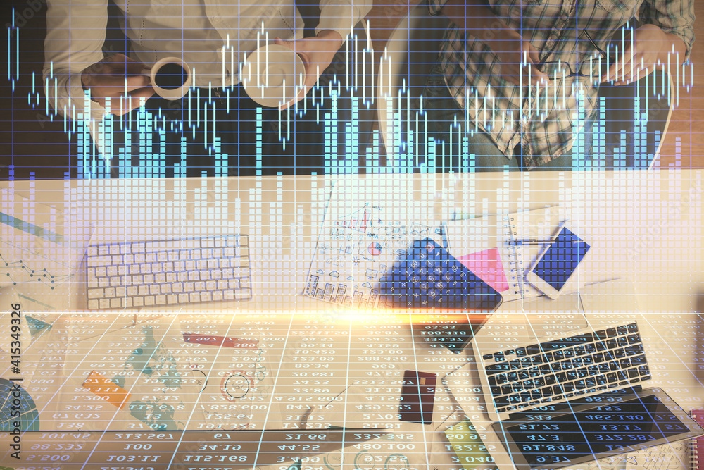Double exposure of man and woman working together and financial chart hologram drawing. market analysis concept. Computer background. Top View. Double exposure of man and woman working together and financial chart hologram drawing. market analysis concept. Computer background. Top View.
