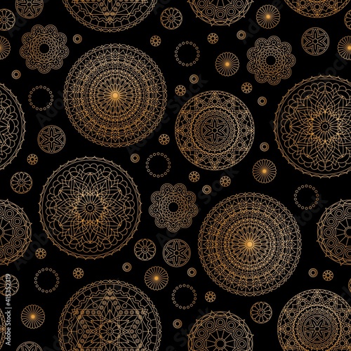 Seamless pattern with golden lace mandalas on black background. Vector drawing.