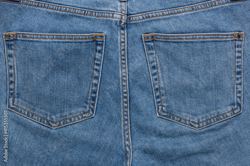 Light Blue Jeans denim texture- back view pocket close up Detail