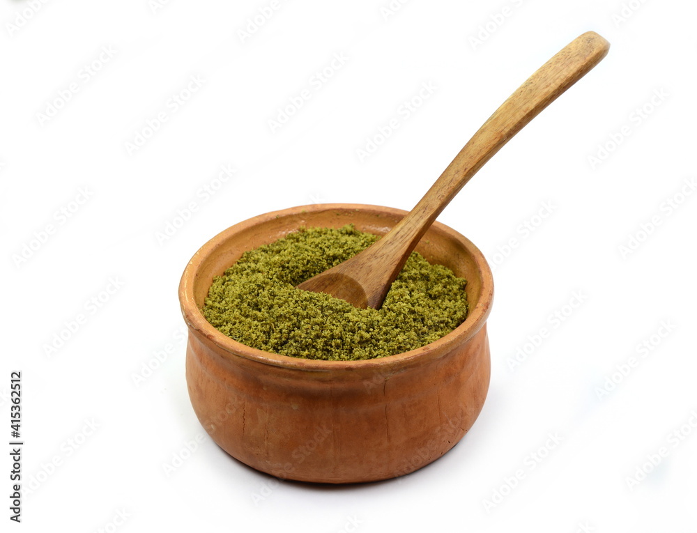 Ground pumkin seed isolated on white background. Pile of fresh pumpkin seed flour isolated. Pumpkin protein. Ground pumkin seed isolated on white background. Pile of fresh pumpkin seed flour isolated. Pumpkin protein.
