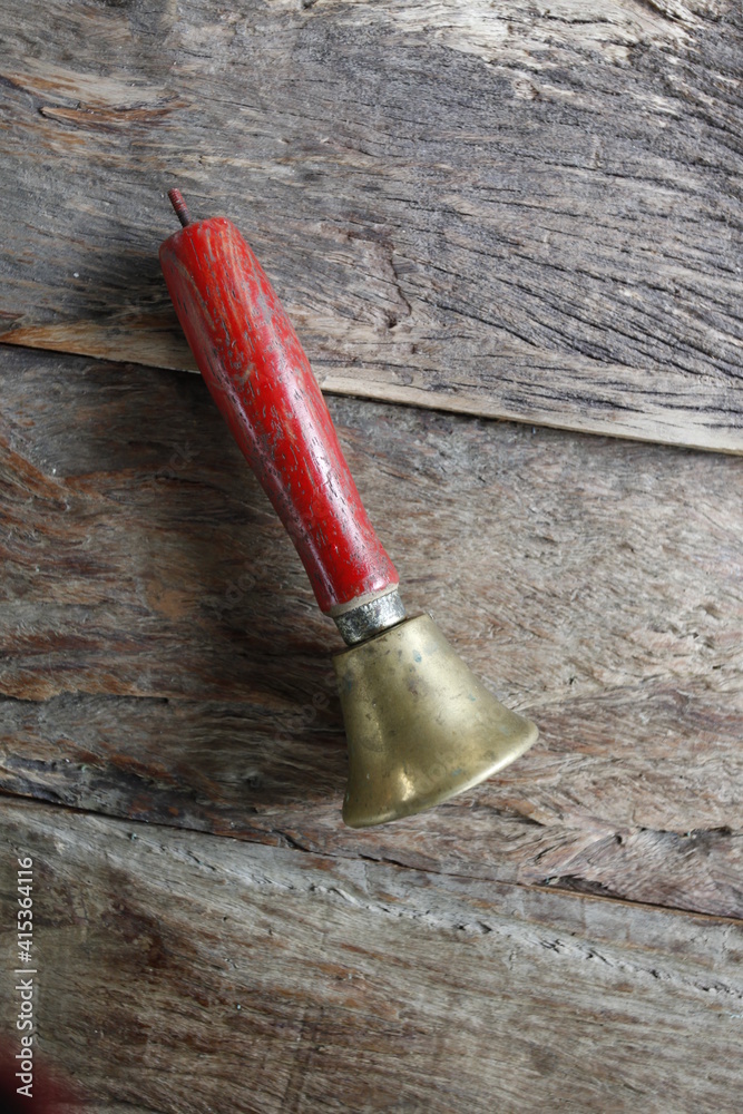 bell on wooden background