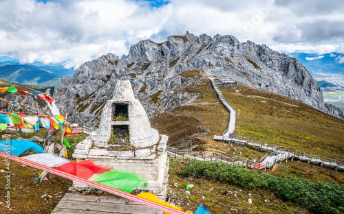 Tibetan Buddhist offering burning place and Shika snow mountain summit view in Shangri-La Yunnan China photo