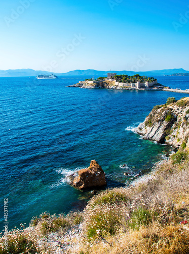 The road goes to Pigeon Island in Kusadasi. Kusadasi is a popular tourist destination in Turkey.