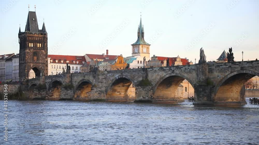 Charles Bridge over Vltava river in winter sunset, pedestrians only bridge in Prague, Czech Republic Charles Bridge over Vltava river in winter sunset, pedestrians only bridge in Prague, Czech Republic