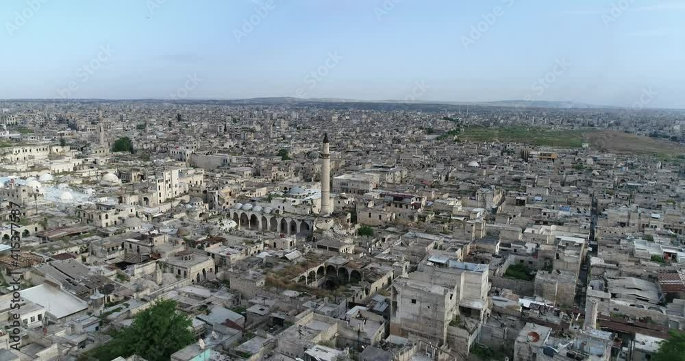 Aerial view above Aleppo in Syria 10 years after the civil war. We can see the city all over the horizon 4K Aerial view above Aleppo in Syria 10 years after the civil war. We can see the city all over the horizon 4K