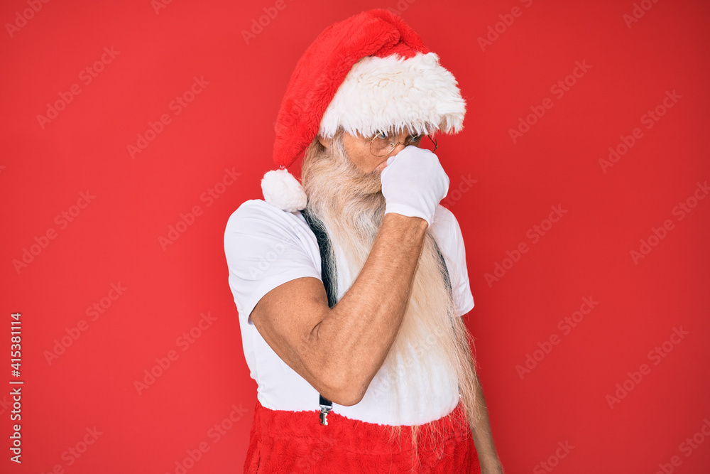 Old senior man with grey hair and long beard wearing white tshirt and