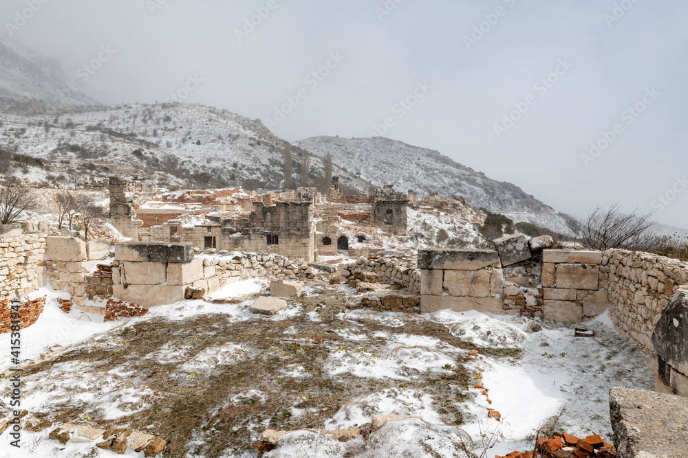 Fototapeta premium Welcome to Sagalassos. Isparta, Turkey.To visit the sprawling ruins of Sagalassos, high amid the jagged peaks of Akdag, is to approach myth: the ancient ruined city set in stark