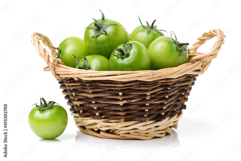 green tomato on white background.