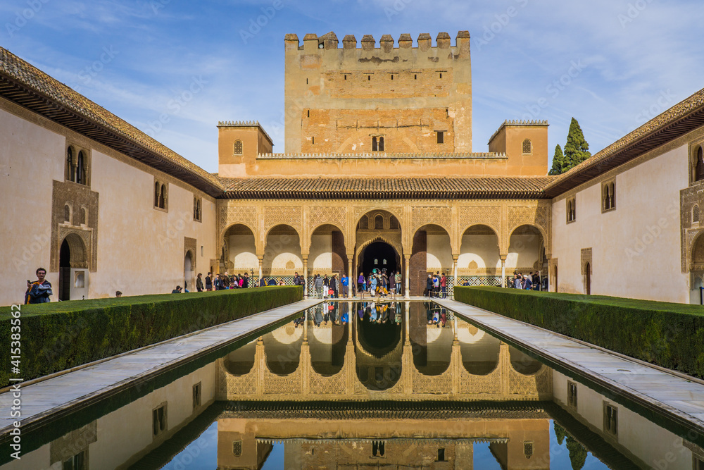 Fototapeta premium Inside the Nasrid palaces, the interior courtyard of these beautiful palaces, parts of the Alhambra complex in Granada, Andalusia (Spain)