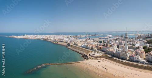 Drone panoramic view of Cadiz City. View of the south part of the city. In background the commercial harbour. Costa de Luz  - Spain © alexemarcel