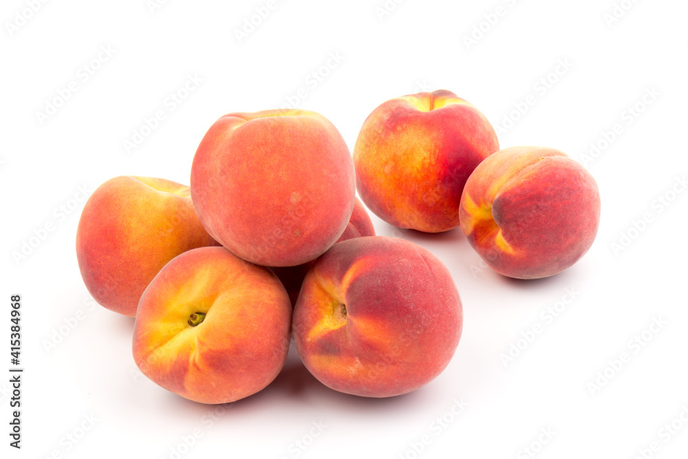 Summer fruit background. Ripe juicy peaches on white background. Copy space. Fresh organic fruit vegan food. Harvest concept Summer fruit background. Ripe juicy peaches on white background. Copy space. Fresh organic fruit vegan food. Harvest concept