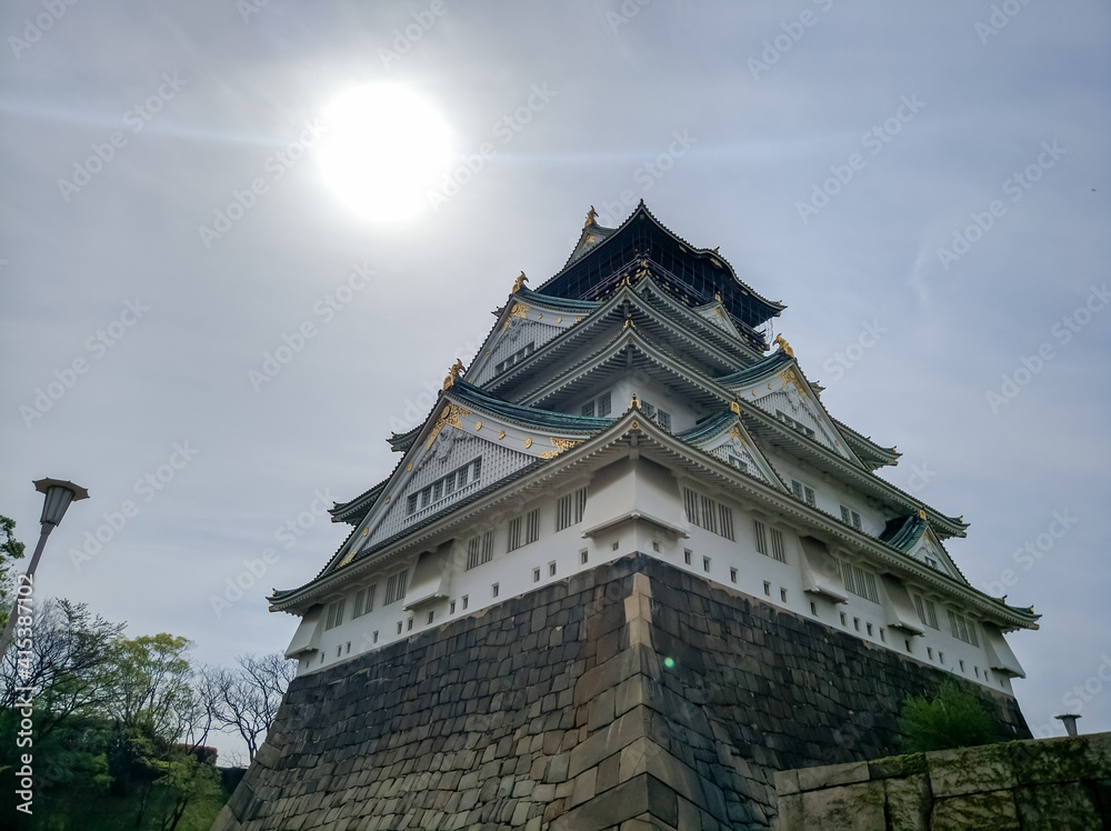 OSAKA, JAPAN - APRIL 4, 2018: Osakajo Great White Castle in Osaka, Japan. Construction of Osaka Castle, osakajo began in 1583 on the site of the former Ishiyama Hongan-ji Temple.