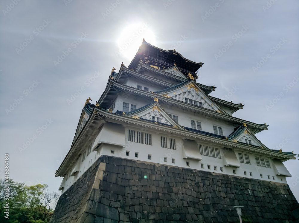 OSAKA, JAPAN - APRIL 4, 2018: Osakajo Great White Castle in Osaka, Japan. Construction of Osaka Castle, osakajo began in 1583 on the site of the former Ishiyama Hongan-ji Temple. OSAKA, JAPAN - APRIL 4, 2018: Osakajo Great White Castle in Osaka, Japan. Construction of Osaka Castle, osakajo began in 1583 on the site of the former Ishiyama Hongan-ji Temple.