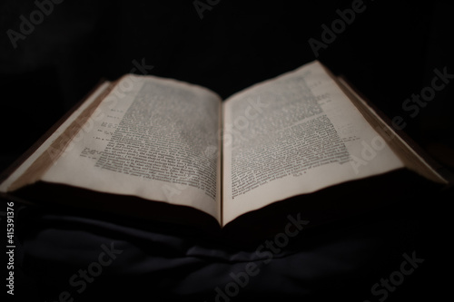 17th century book in original binding. Gold initials of owner to front cover.  photo