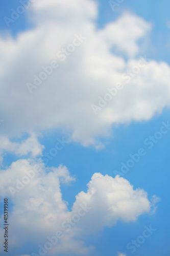 Tilt-shift lens effect white cloud and blue sky texture background