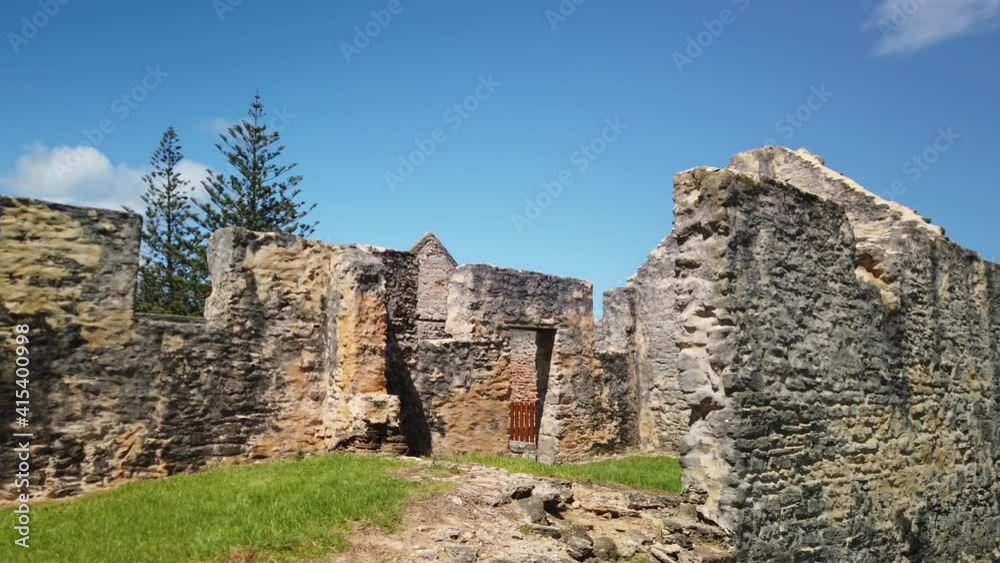 Right to left panning view of the Historic ruins of the Civic Hospital in the early morning sunrise light, Norfolk Island, Australia Right to left panning view of the Historic ruins of the Civic Hospital in the early morning sunrise light, Norfolk Island, Australia