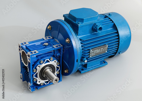 blue motor gearbox subject on light gray background, side view