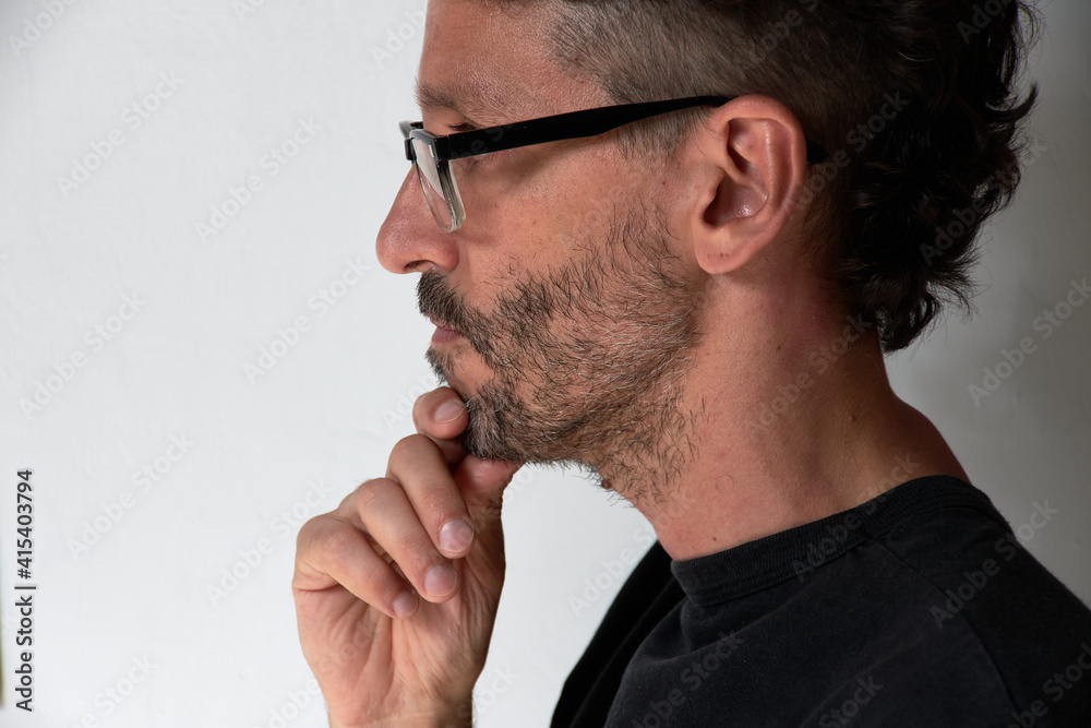 man in profile shirt reflecting