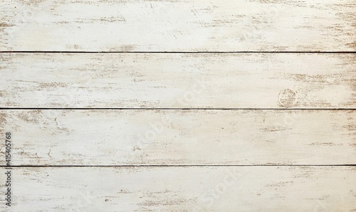 Background of aged rough white painted wooden boards close up.
