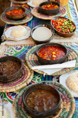 Arabic Cuisine. Traditional Egyptian food. Egyptian oriental dinner meat with red sauce and salad. African food.