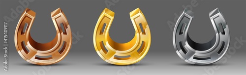 Vector set of metal plated horseshoes in gold, bronze and silver. 