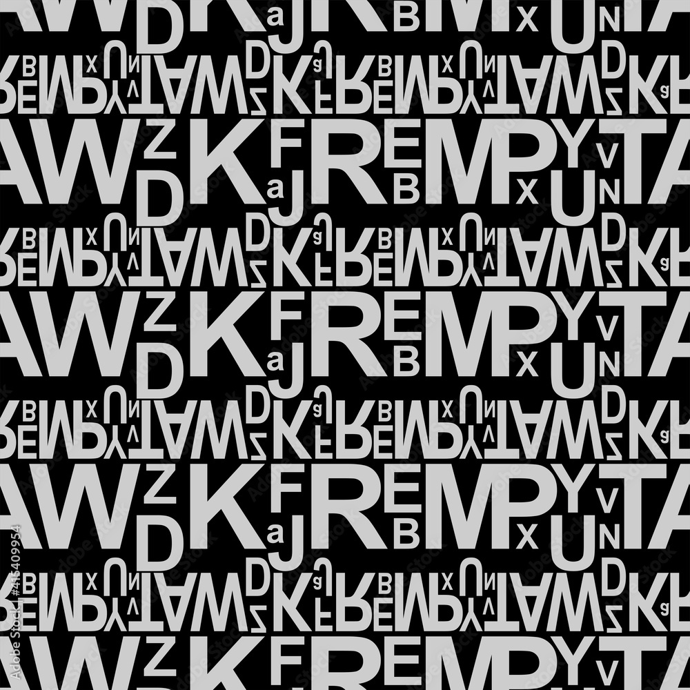 Fototapeta premium Light gray letters on a black background.