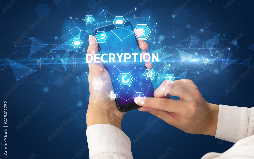 Female hand holding smartphone with DECRYPTION inscription, modern technology concept Female hand holding smartphone with DECRYPTION inscription, modern technology concept