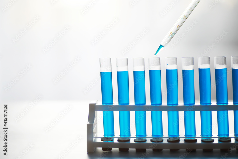 Vaccine vial search concept on table. Close up Vaccine flaskl for prevention,immunization and treatment. Vaccine vial search concept on table. Close up Vaccine flaskl for prevention,immunization and treatment.