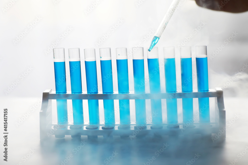 Vaccine vial search concept on table. Close up Vaccine flaskl for prevention,immunization and treatment. Vaccine vial search concept on table. Close up Vaccine flaskl for prevention,immunization and treatment.
