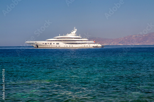 Luxury yacht next to downtown of   famous Mykonos town  (Mykonos island)