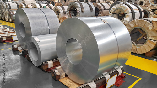 Photos Cold rolled and Hot rolled steel sheet in coil with steel strapping in warehouse