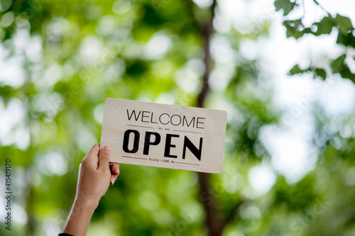 Hand and sign store opening