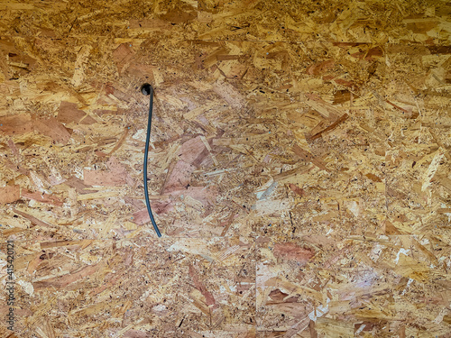 Installation of a new wall in a small home with mdf board, the with an opening for the electric wire