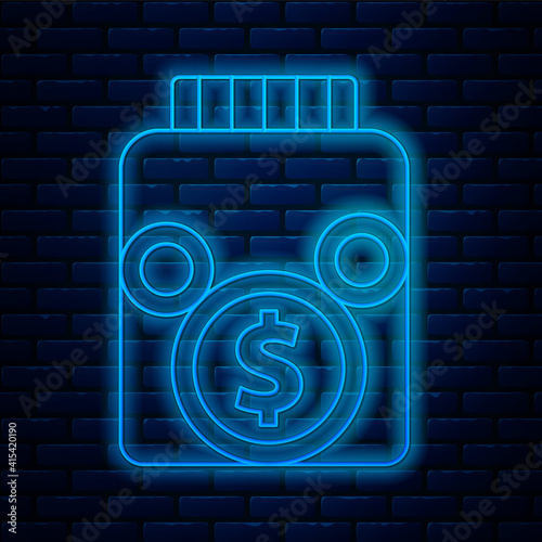 Glowing neon line Glass money jar with coin icon isolated on brick wall background. Icon saving or accumulation of money, investment. Vector.
