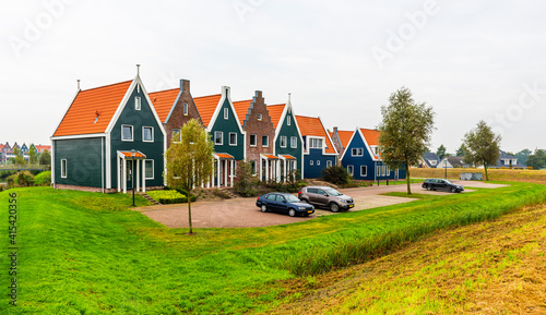 Volendam is a town in North Holland in the Netherlands. Colored houses of marine park in Volendam. North Holland, Netherlands..