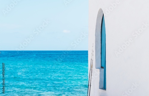Sea views from the white house with blue door in Cala Barraca, Javea, Alicante province, Spain photo