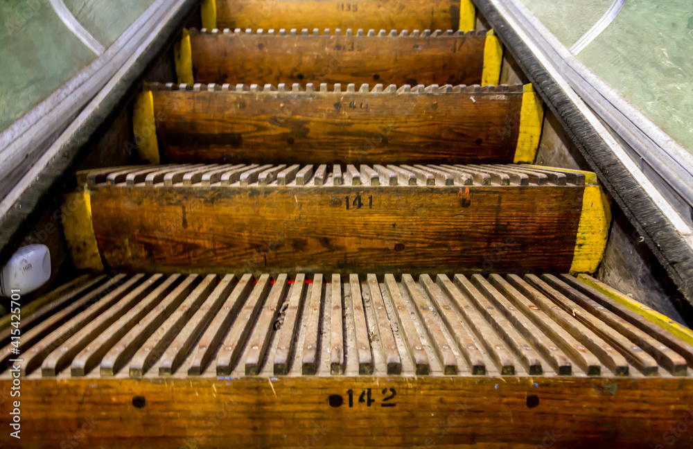 Fototapeta premium Old, wooden, numbered Escalator steps