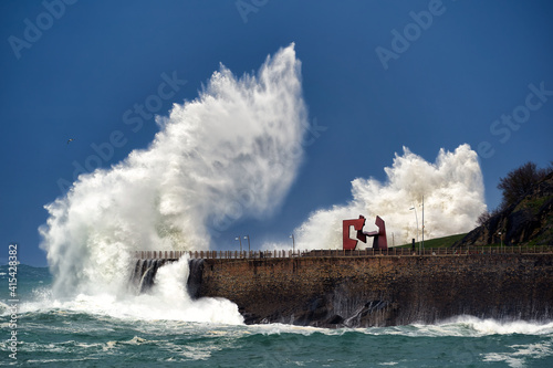 Wave caused by big storm crashing coastline in San Sebastian Donostia © Unai