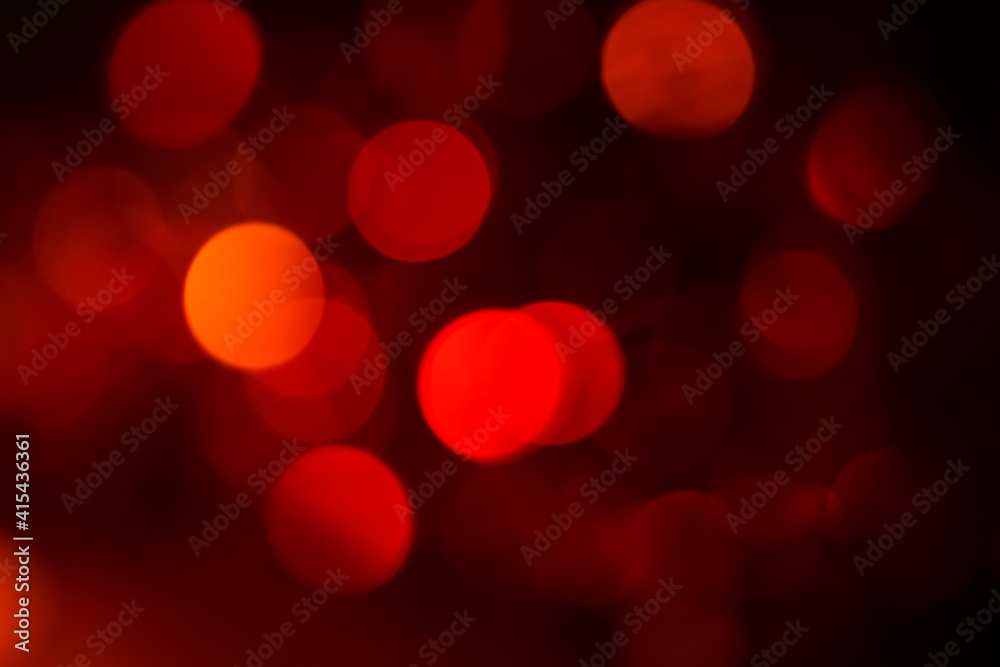 Bokeh abstract texture colorful red defocused background Dimmed light.	